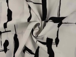Viskose, grafische, wilde Musterung Weiß mit schwarzer Musterung